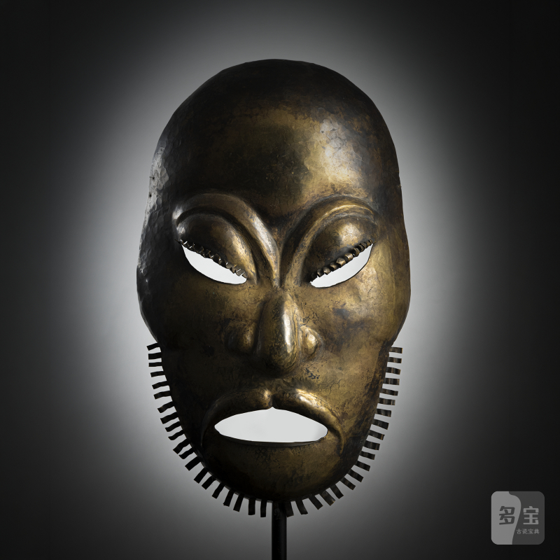 A metal ritual mask